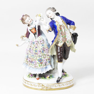 Lot 49 - A Naples porcelain figure group, of an 18th...