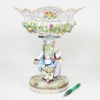 Lot 116 - A Meissen style porcelain figural basket,...