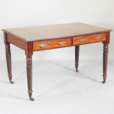 Lot 259 - A 19th century mahogany writing desk, on...