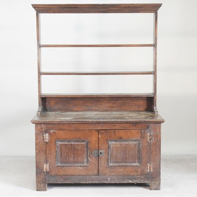 Lot 283 - An antique oak dresser, with an open plate rack