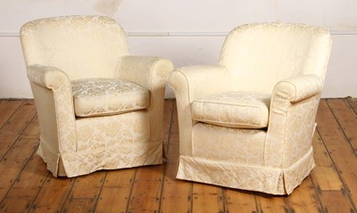 Lot 661 - A pair of white floral upholstered armchairs