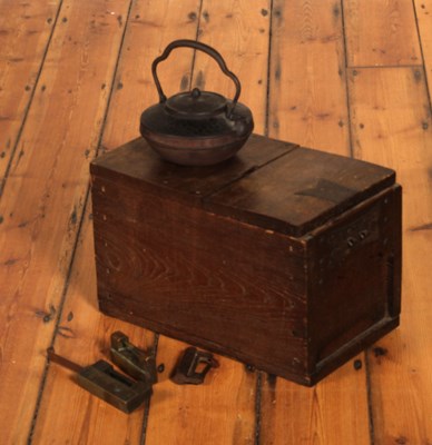 Lot 568 - A Japanese elm Hibachi box, containing an iron...