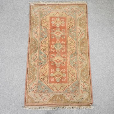 Lot 203 - A Turkish woollen rug