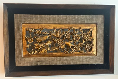 Lot 372 - A Chinese carved giltwood panel, decorated...