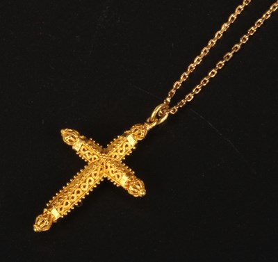 Lot 392 - A yellow metal crucifix pendant and chain