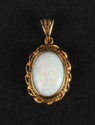 Lot 65 - A 9 carat yellow gold opal cabochon pendant, 3.4g