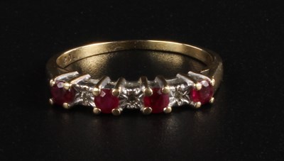 Lot 130 - A 9 carat yellow gold ruby and diamond ring,...