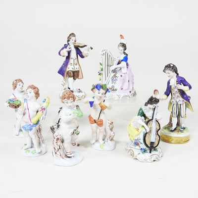 Lot 157 - A set of four Naples porcelain cherubs,...
