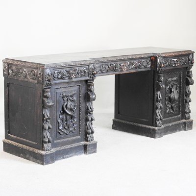 Lot 254 - A 19th century carved oak sideboard, of...