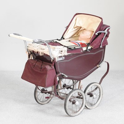 Lot 363 - A vintage Leeway dolls pram, 87cm long, with...