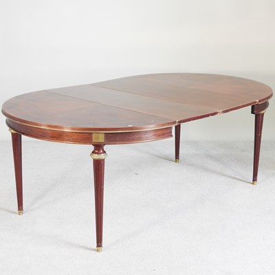 Lot 452 - A French parquetry pull-out extending dining...