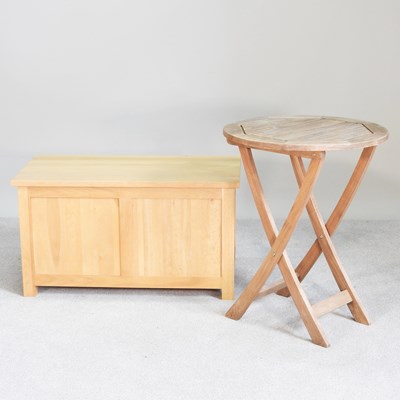 Lot 409 - A modern light oak chest, with a hinged lid,...