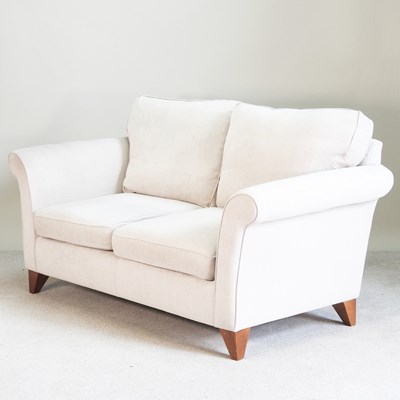Lot 252 - A modern pale grey upholstered two seater sofa,...
