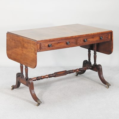 Lot 568 - A Regency mahogany sofa table, with a hinged...