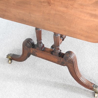 Lot 568 - A Regency mahogany sofa table, with a hinged...