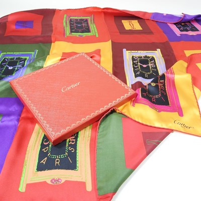 Lot 248 - A Cartier silk scarf, decorated with a...
