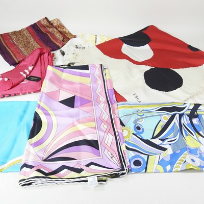 Lot 583 - A collection of silk scarves, to include two...