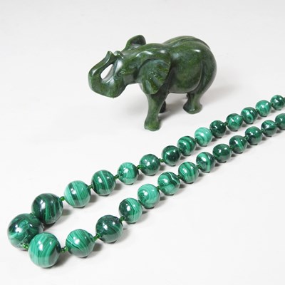 Lot 167 - A malachite single strand graduated bead...