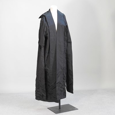 Lot 211 - A black academic gown, by W. Northam