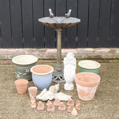 Lot 411 - A collection of garden pots, statues and a...