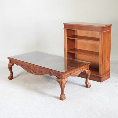 Lot 502 - A reproduction yew wood dwarf open bookcase,...