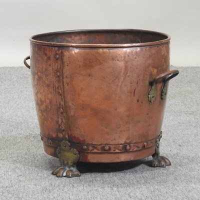 Lot 336 - A hammered copper log basket