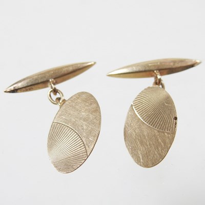 Lot 60 - A pair of 9 carat gold cufflinks, of oval...