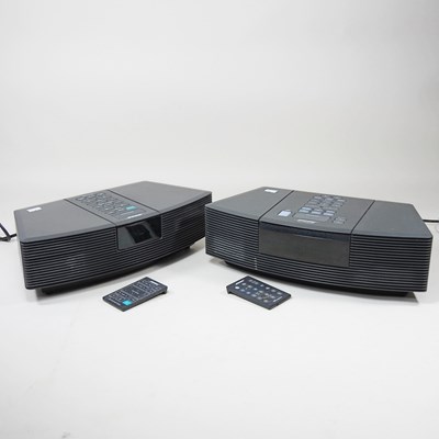 Lot 384 - A Bose CD radio, with remote control, together...