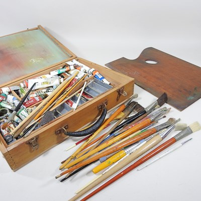 Lot 194 - A wooden cased artists' box, with brushes,...