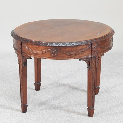 Lot 660 - An Adam style mahogany circular coffee table