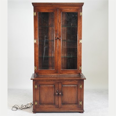 Lot 648 - A modern glazed oak cabinet, by Ellis...