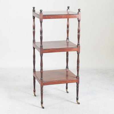 Lot 490 - A Regency mahogany three tier whatnot, united...