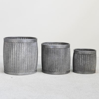 Lot 258 - Three graduated metal garden planters, largest...