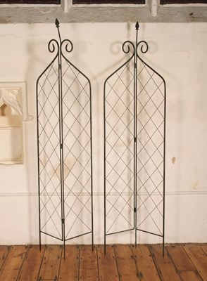 Lot 290 - A pair of metal lattice folding garden spires,...
