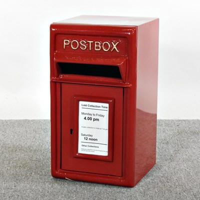 Lot 233 - A red painted metal post box, 44cm high