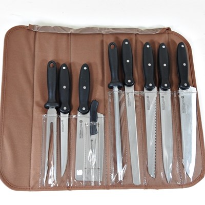 Lot 397 - A nine piece chef's knife set, in bag