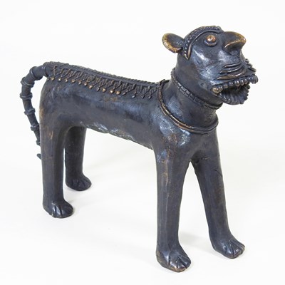 Lot 651 - A modern tribal bronze statue of a lion, 16cm...