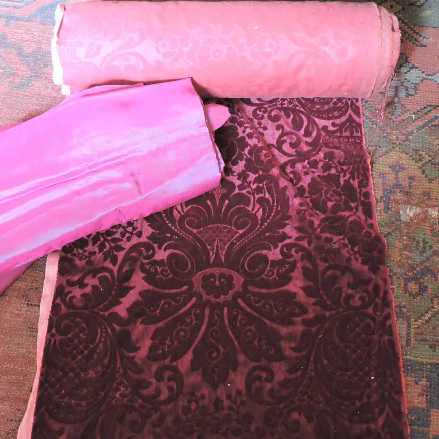 Lot 212 A roll of red velvet damask fabric