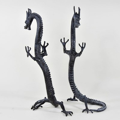 Lot 641 - A pair of bronze book ends, in the form of...