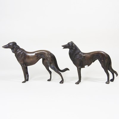 Lot 214 - A bronze statue of a dog, together with...