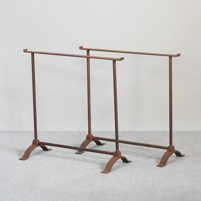 Lot 217 - A pair of metal trestle stands, each 75cm wide...