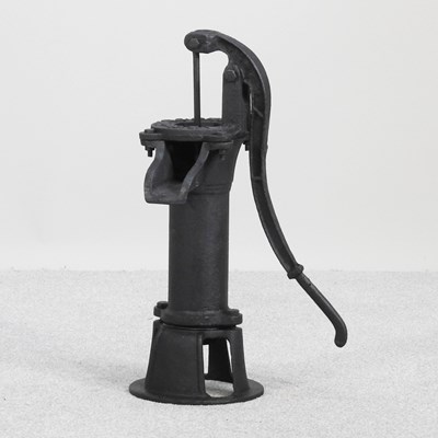 Lot 289 - A small cast iron garden pump, 50cm high