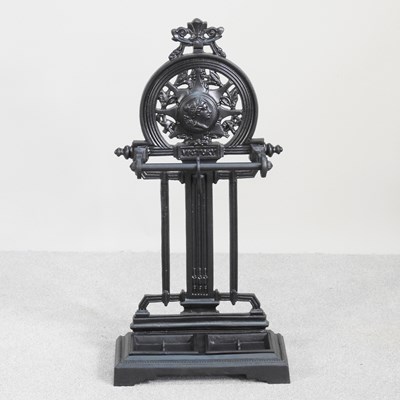 Lot 376 - A Victorian style cast iron stickstand, 88cm high