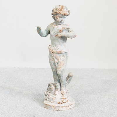 Lot 242 - A metal garden statue of a putti, with...