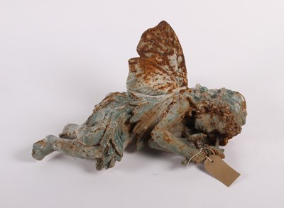 Lot 442 - A verdigris metal model of a sleeping fairy
