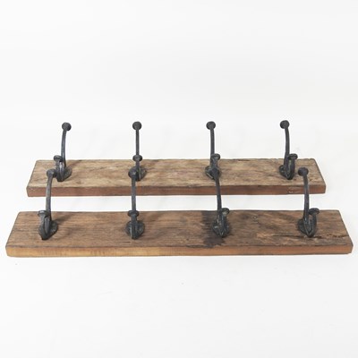 Lot 252 - A pair of rustic wooden coat racks, each 60cm...