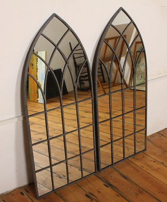 Lot 577 - A pair of tall metal framed gothic arched...