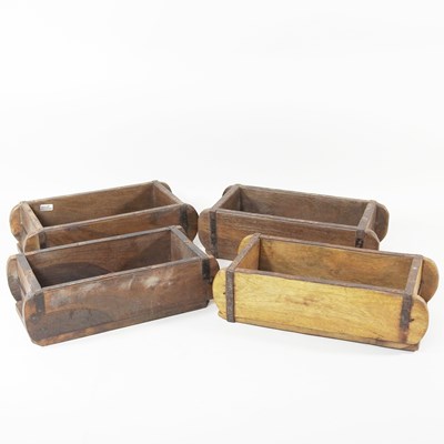 Lot 519 - Four wooden brick moulds, 32cm wide (4)