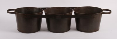 Lot 656 - A set of three metal connected garden planters