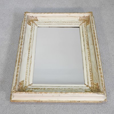 Lot 509 - A white painted and gilt framed wall mirror,...